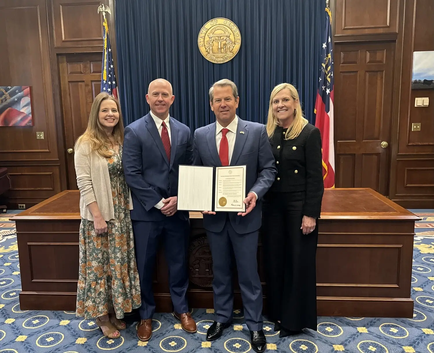 Lobb-E founder Buddy Costley receiving recognition of his retirement from public service from Georgia Governor Brian P. Kemp and First Lady Marty Kemp at the Georgia State Capitol